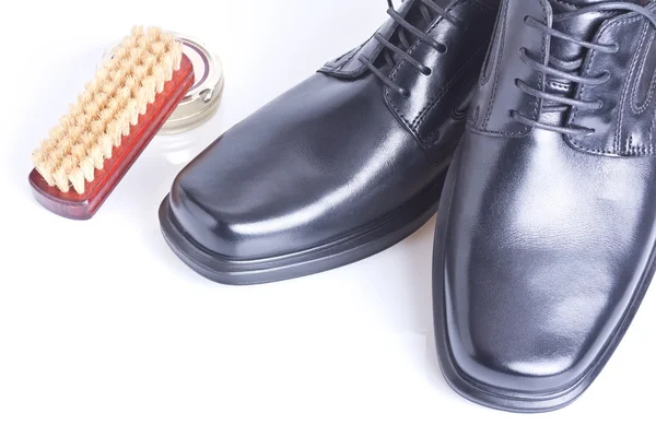 Classic black men's shoes, boot polish and brush — Stock Photo, Image
