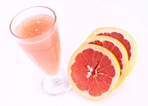 Grapefruit juice and fruit — Stock Photo, Image