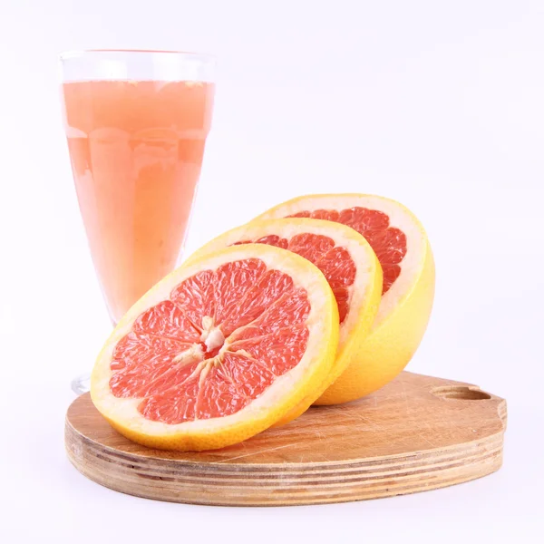 Grapefruitsaft und Obst — Stockfoto