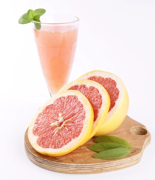 Grapefruktjuice och frukt — Stockfoto