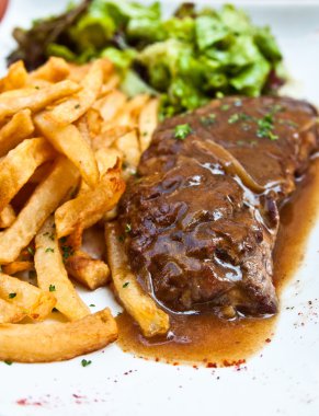 Steak beef meat with tomato and french fries