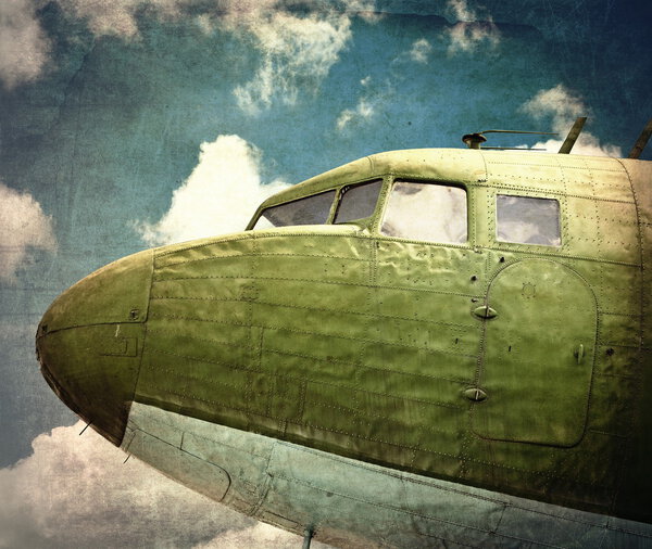 Grunge old military plane close up