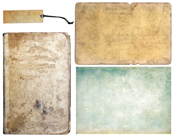 Вінтажна книга, мітка, папір і стара поштова листівка — стокове фото