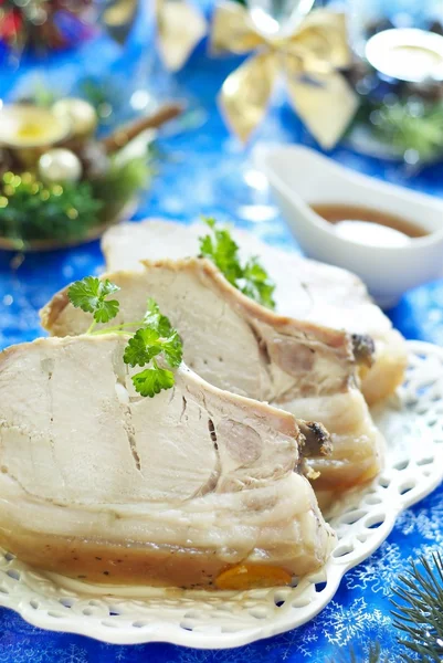 stock image Christmas roast pork in ginger glaze with citrus sauce