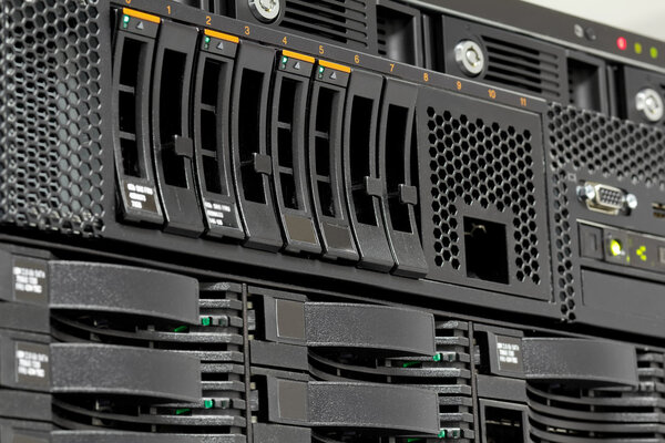 Servers stack with hard drives in a datacenter