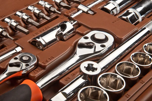 Kit of chrome tools as background — Stock Photo, Image