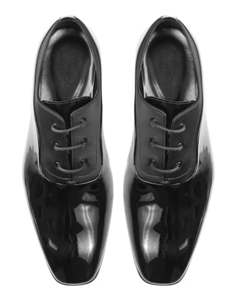 Классические блестящие черные мужские туфли — стоковое фото