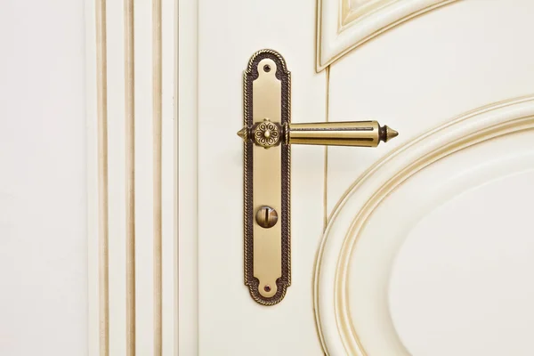 White wooden door with metallic door handle — Stock Photo, Image