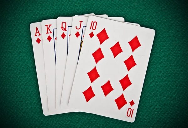 A royal straight flush playing cards poker hand — Stock Photo, Image