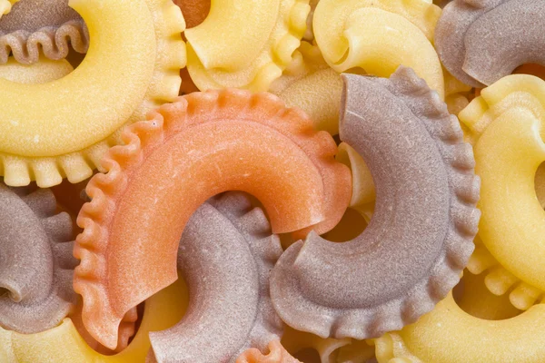 Крупним планом сирі італійські макарони - Пенне Ліцензійні Стокові Зображення