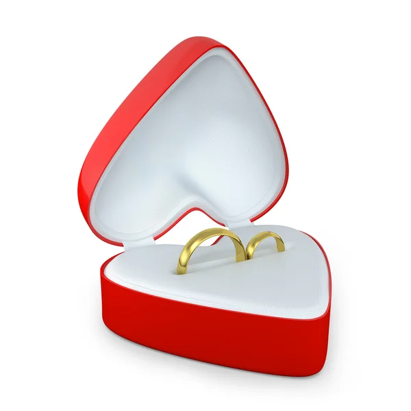 Pair of wedding rings in a heart shaped box — Stock Photo, Image