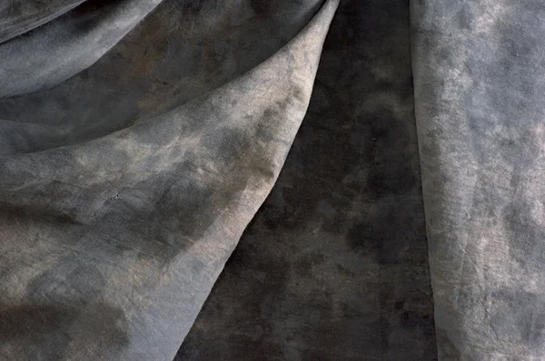 Sfondo di stoffa grigio screziato con ombre — Foto Stock