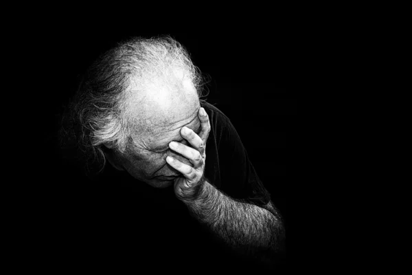 Man holding face in dispair — Stock Photo, Image
