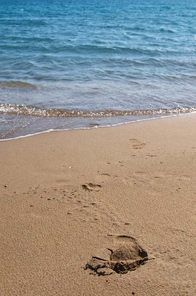 stock image Footprints on the beach