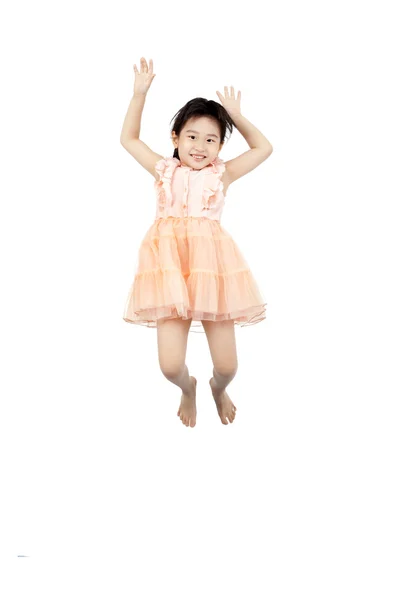 Felice asiatico piccolo jumping in the air — Foto Stock