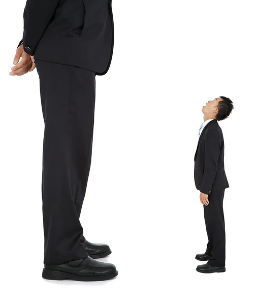 Little businessman looked at a giant businessman — Stock Photo, Image