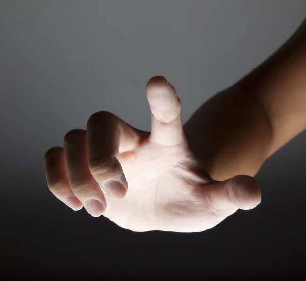 Hand touching in the dark — Stock Photo, Image
