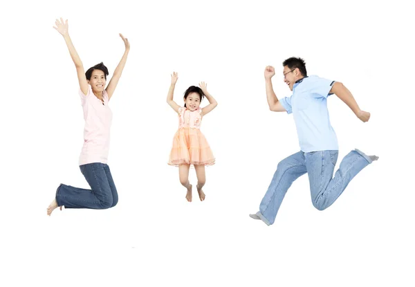 Счастливая семья прыжки и изолированы на белом фоне — стоковое фото