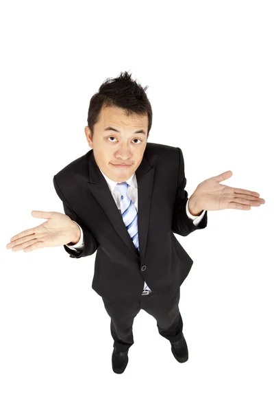 Hombre de negocios asiático encogiéndose de hombros y aislado en blanco —  Fotos de Stock