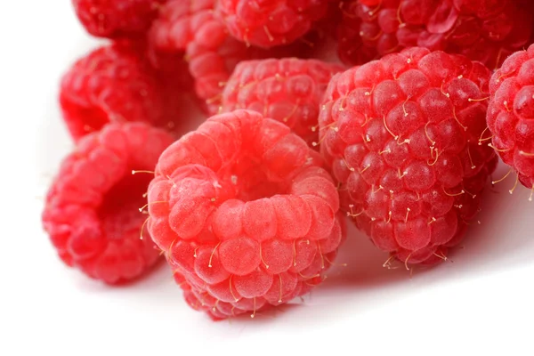 Fresh raspberries over white — Stock Photo, Image
