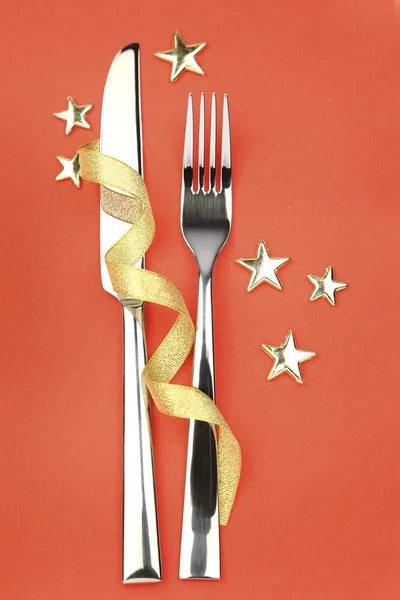 Knife and fork with ribbon, stars — Stock Photo, Image