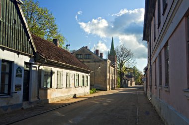 Historical street in Kuldiga, Latvia. clipart