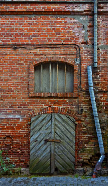 Detail of a red brick building. — Stock Photo, Image