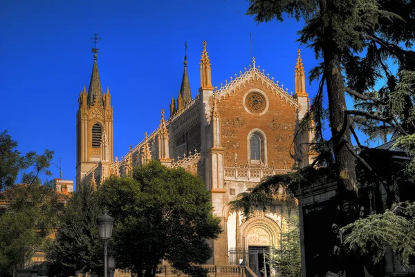 Parish church in rays of sun, sunrise, Madrid — Stock Photo, Image