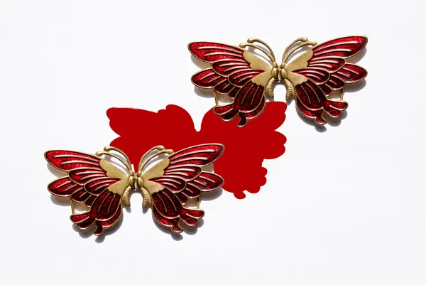 Duas borboletas vermelhas metálicas isoladas no branco — Fotografia de Stock