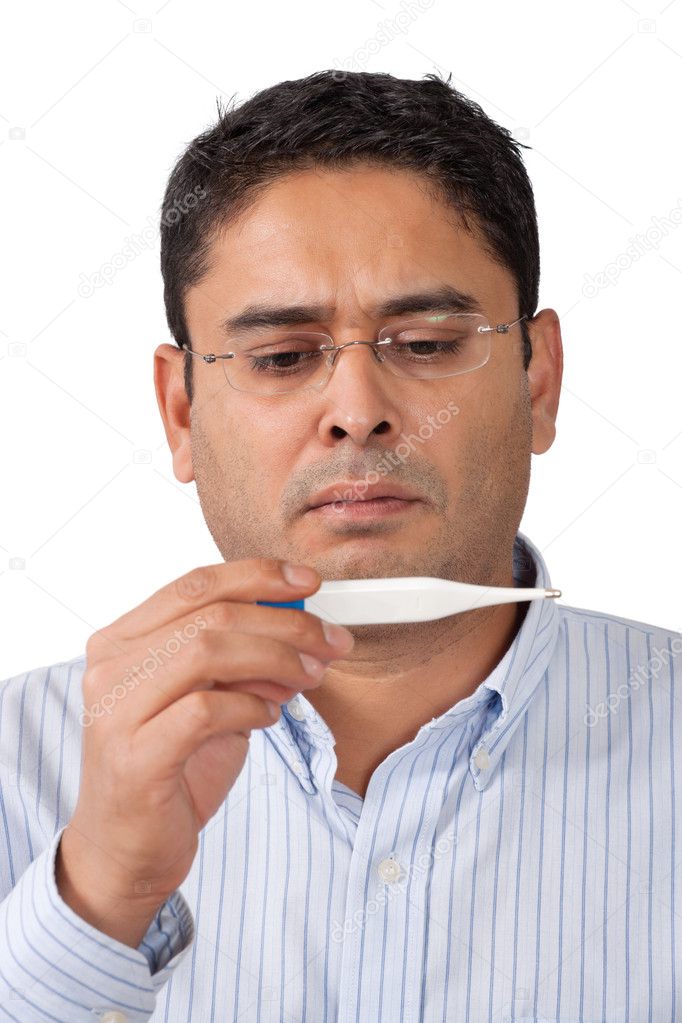 Man looking at thermometer