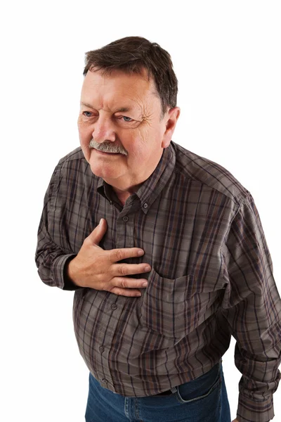 Man in his sixties having chest pain — Stockfoto