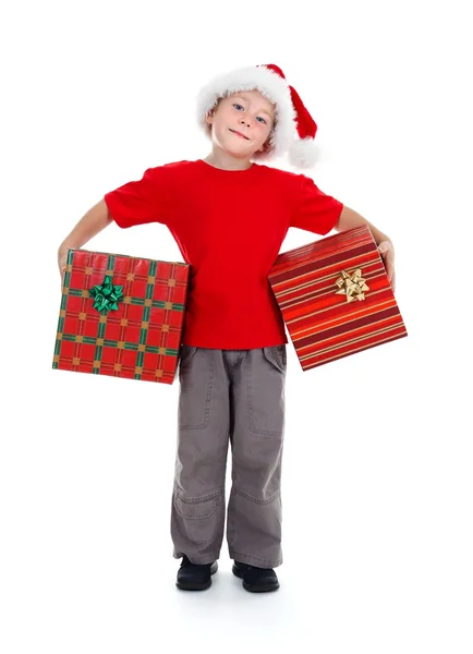 Menino segurando presentes de Natal — Fotografia de Stock