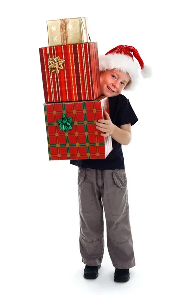 Улыбающийся мальчик с подарками — стоковое фото