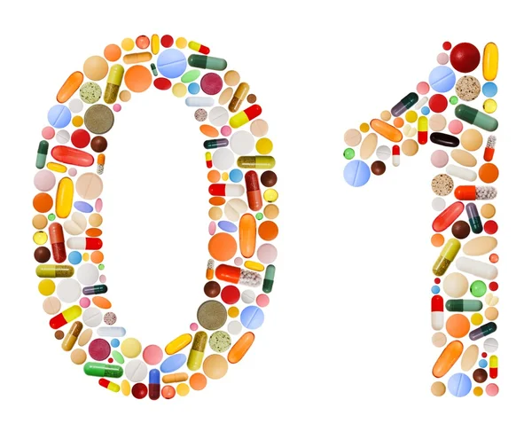 Čísla 0 a 1, vyrobené z různých barevných pilulek — Stock fotografie