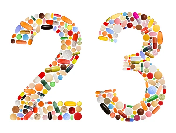 Números 2 e 3 feitos de várias pílulas coloridas — Fotografia de Stock