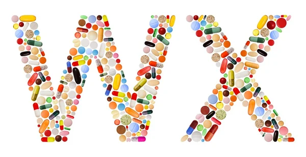 Personaggi W e X fatti di pillole colorate — Foto Stock