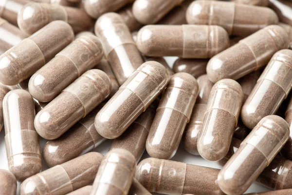 Las píldoras medicinales apilaron un montón —  Fotos de Stock