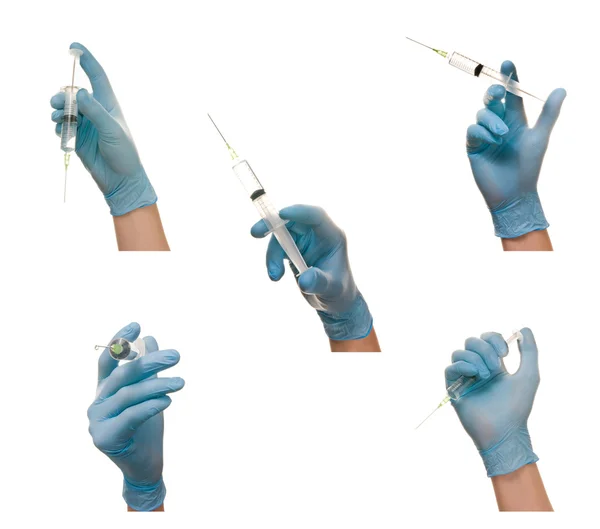 Hand and syringe — Stock Photo, Image