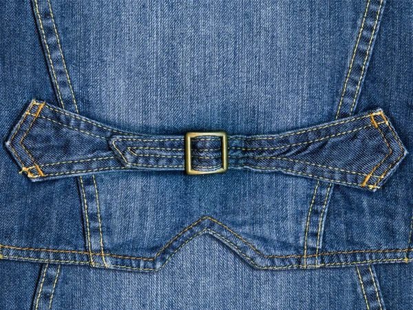 Синяя джинса с застежкой из жёлтого металла — стоковое фото