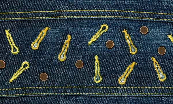 Jeans textuur achtergrond met metalen klinknagels en knoopsgaten — Stockfoto
