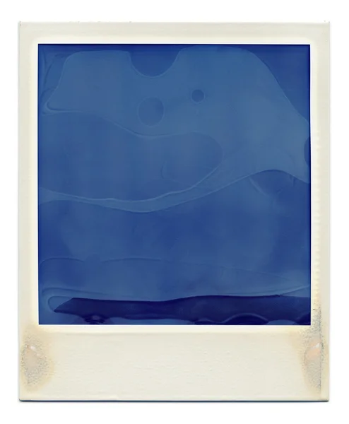 Moldura de filme instantâneo azul em branco — Fotografia de Stock