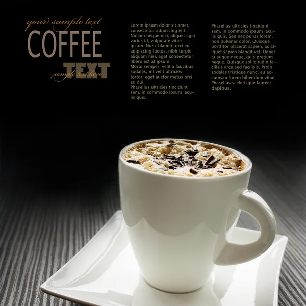 Cappuccino csésze fehér csokoládé sprinkles — Stock Fotó