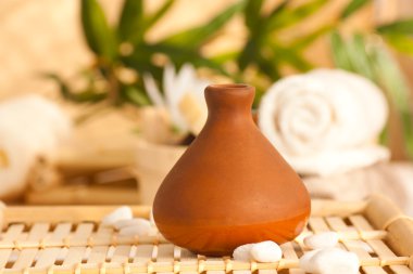 Clay pot diffuser with essentail oils clipart