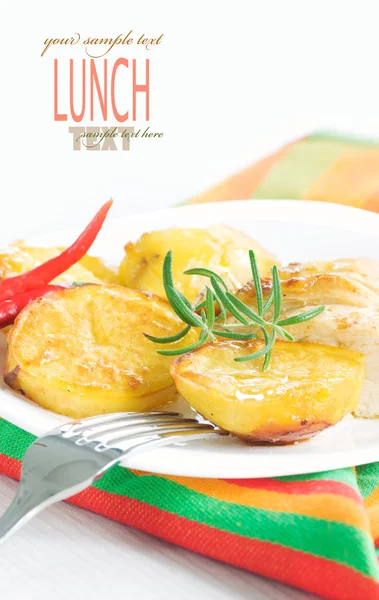 Baked chicken with potatoes — Stock Photo, Image