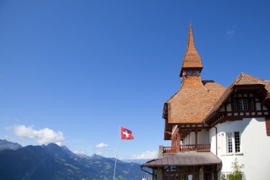 Alpine house in Interlaken, Switzerland clipart