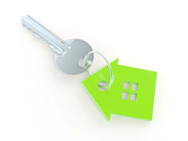 Ключ з зеленим будиночком дрібничка Ліцензійні Стокові Зображення