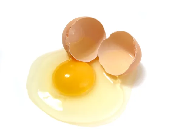 Broken egg on white — Stock Photo, Image