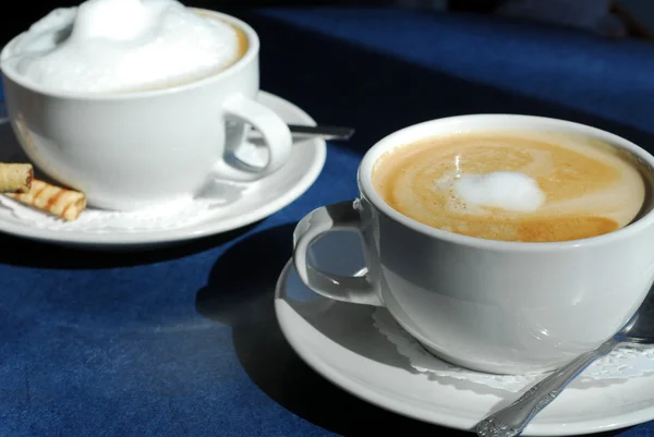 Cappuccino e latte — Fotografia de Stock