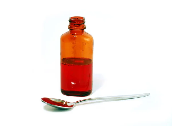Cough syrup on white — Stock Photo, Image