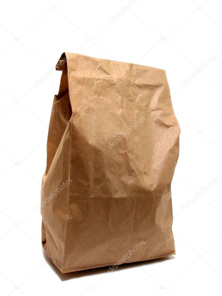 Folded Brown Paper Bag Isolated on White Background. Shopping Bag